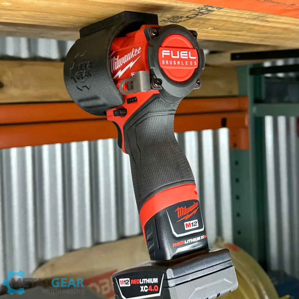 Milwaukee cordless power tool secured in the MGS-081 Holster by Metalgear Engineering—a rugged, 3D-printed tool holster designed for reliable mounting on walls, workbenches, or 80/20 framing in workshop and industrial environments.