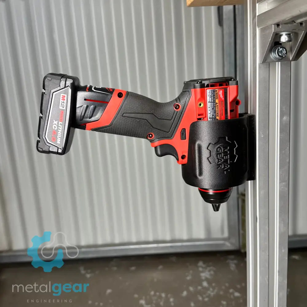 Milwaukee cordless power tool secured in the MGS-081 Holster by Metalgear Engineering—a rugged, 3D-printed tool holster designed for reliable mounting on walls, workbenches, or 80/20 framing in workshop and industrial environments.