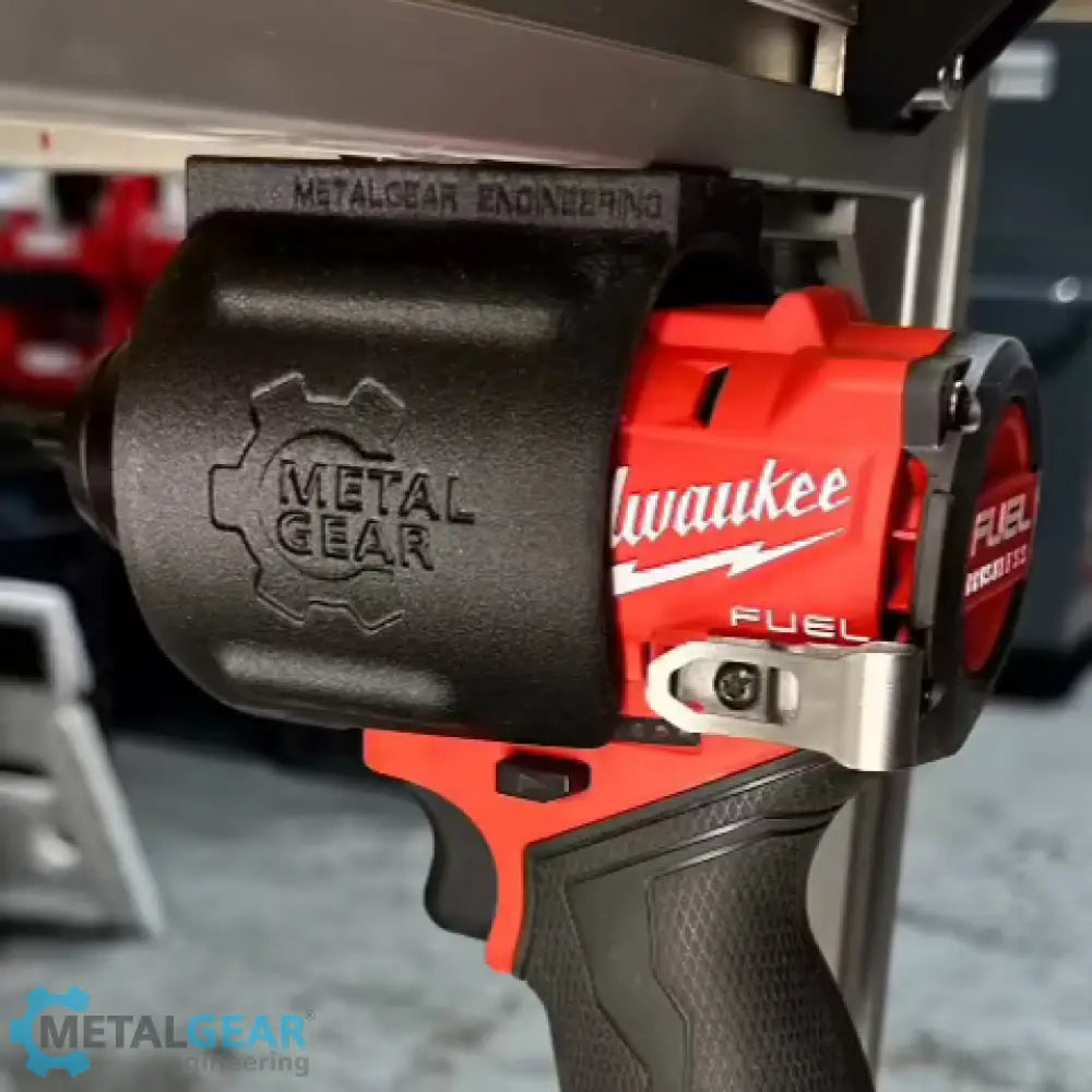 Milwaukee cordless power tool secured in the MGS-081 Holster by Metalgear Engineering—a rugged, 3D-printed tool holster designed for reliable mounting on walls, workbenches, or 80/20 framing in workshop and industrial environments.